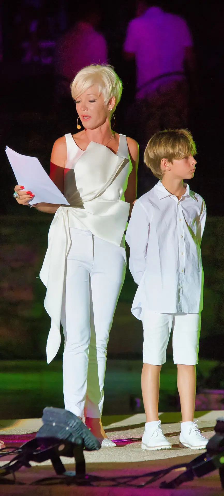 Aurore and her son Matisse on stage during a soirée blanche at Esterel Caravaning