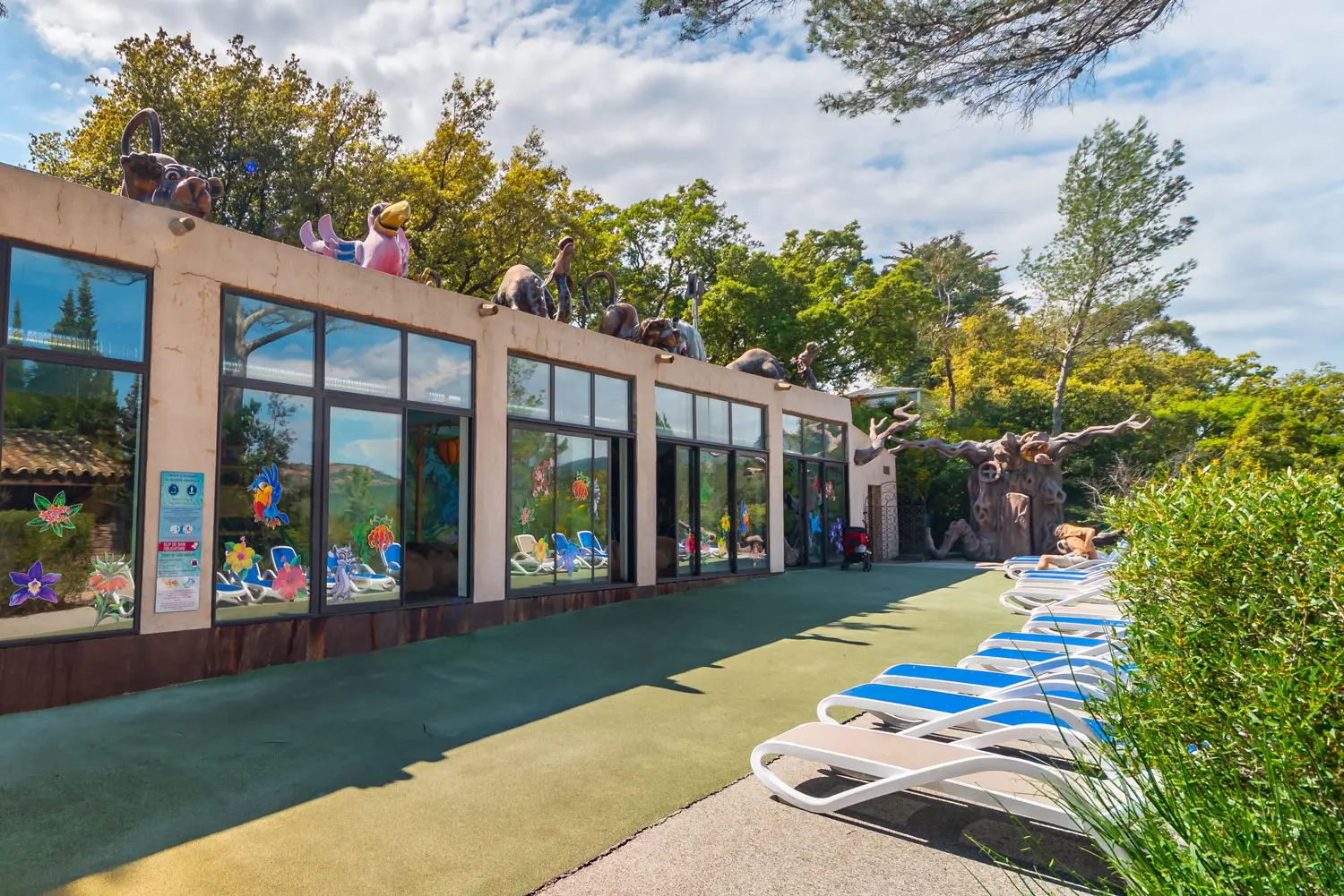The Baby Club and Jungle Pool building at Esterel Caravaning, decorated with animals