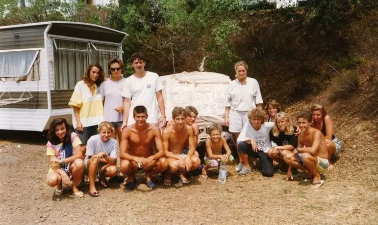 Esterel Caravaning entertainment team in front of a car covered in toilet paper in 1989