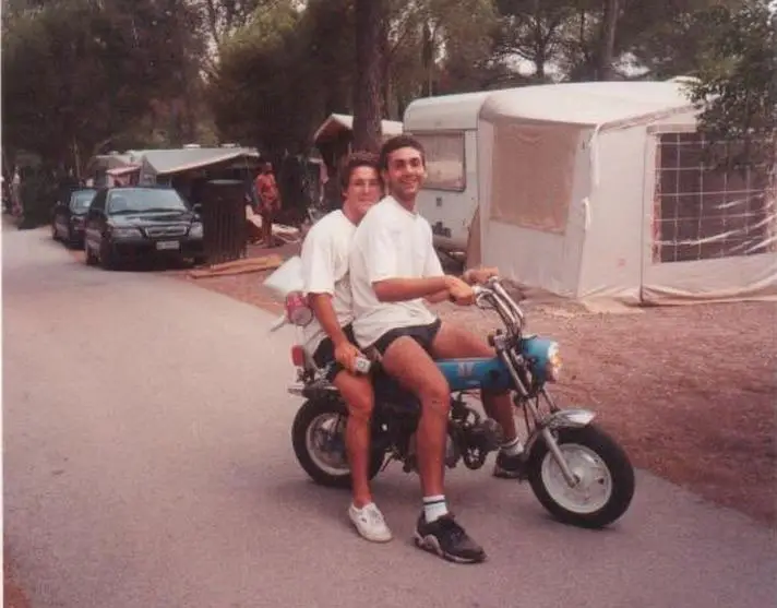 Alban Eraclas and another entertainer announcing the evening events by motorbike at Esterel Caravaning in 1997
